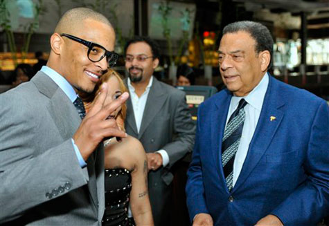 T.I. and Tiny greet former Congressman Andrew Young.