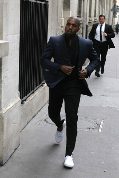 Kanye West Runs to Paris Fashion Week, While Jay-Z Previews 'Watch