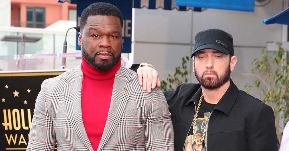 50 Cent and Eminem pose during a ceremony honoring 50 Cent with a star on the Hollywood Walk of Fame