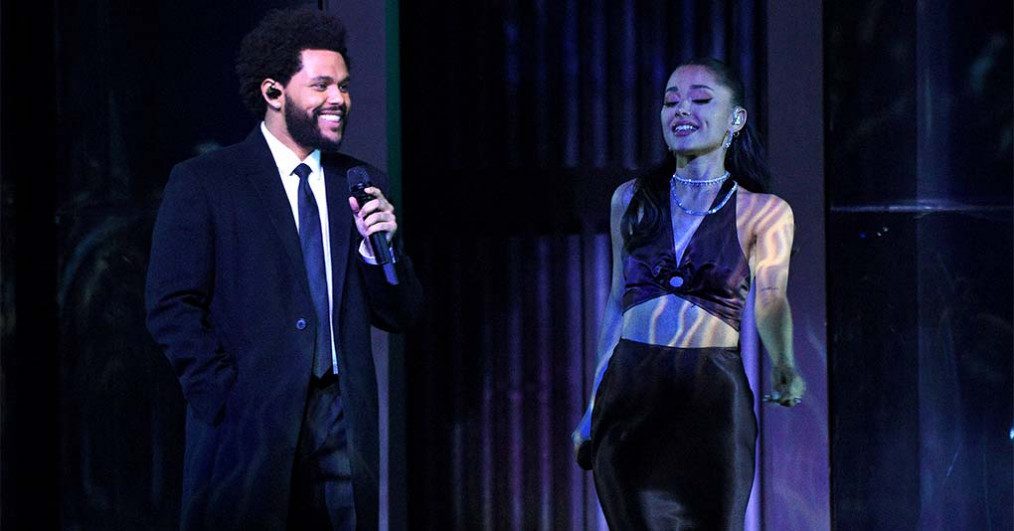 The Weeknd and Ariana Grande perform onstage at the 2021 iHeartRadio Music Awards