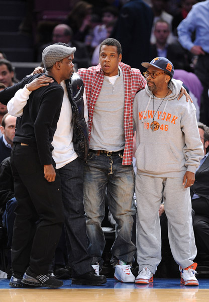 Chris Rock, Diddy, Jay-Z, and Spike Lee huddle up.
